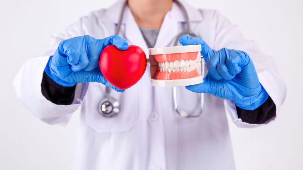 dentist showing teeth with love